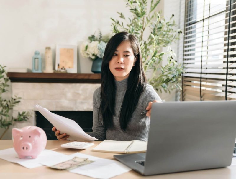 close-up-hand-of-business-woman-using-laptop-while-plan-and-discussion-information-for-financial-.jpg